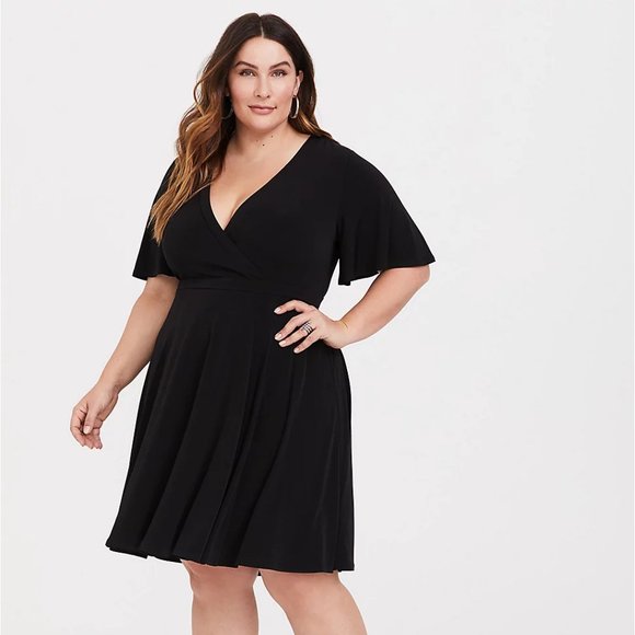 Torrid Dresses & Skirts - Torrid Mini Studio Knit Faux Wrap Dress Black Surplice Neck Short Sleeve Size 3X